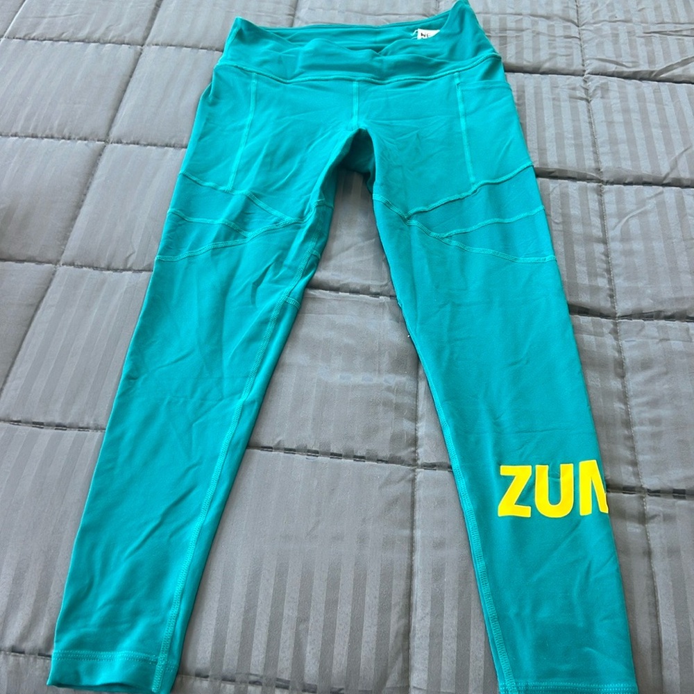 Size medium turquoise color great condition